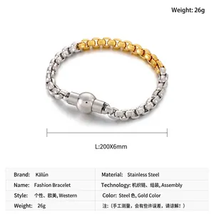 Macro detail of 6mm two-tone stainless steel box chain bracelet with magnetic clasp