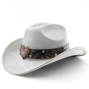 Detail of grey suede cowboy hat with paisley band and rhinestone heart buckle