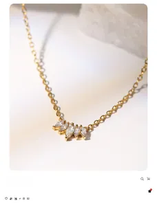 Detailed close-up of 18k gold plated necklace featuring five marquise-cut zircon stones
