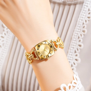 Vintage gold square quartz watch with metal chain strap and Roman numerals on wrist