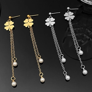 Elegant gold and silver four-leaf clover drop earrings with long tassels and pearls