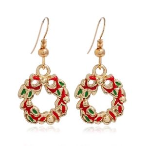 Close-up of Christmas wreath drop earrings with festive red and green oil drip detail