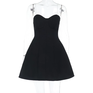 Detail of black strapless mini dress with structured bodice and thin transparent straps