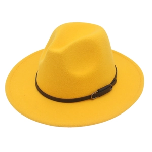 Close-up of a bright yellow fedora hat with a brown leather strap and metal buckle