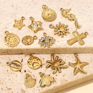 Gold-plated stainless steel DIY charms in shapes of starfish, seahorse and cross