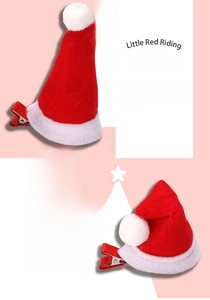 Detail of mini plush Christmas hat hair clips in straight and curved styles for festive wear