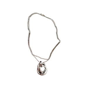 Minimalist silver interlocking circle pendant necklace with zircon detail on fine chain