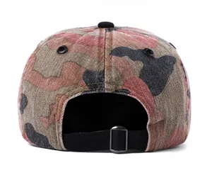 Detail view of the camouflage baseball cap back with adjustable strap and metal buckle