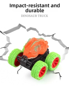 Detail view of the durable non-slip tires and chassis on the dinosaur toy monster truck