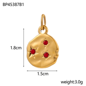 Detailed view of 1.8cm gold round pendant with three red rhinestones and measurements