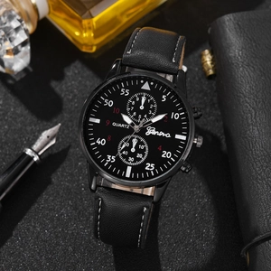 Men's fashion quartz watch with black leather strap and dial in a luxury business setting