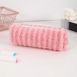 Close-up of pink fuzzy sherpa pencil case with soft plush texture and zipper detail