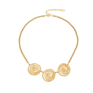 Golden irregular geometric link necklace with three spiral textured pendants on white backdrop