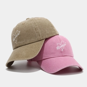 Washed cotton baseball caps with Mama embroidery in khaki and pink colors for women