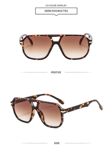 Detail view of aviator sunglasses with demi tortoise frames and gradient tea lenses