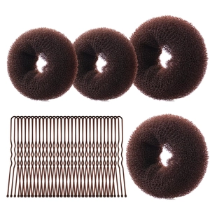 Brown hair bun maker set with four sponge donuts and U-shaped hairpins on white background