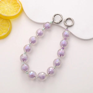 Detail of lavender acrylic faceted bead chain with silver spring rings and lemon accents