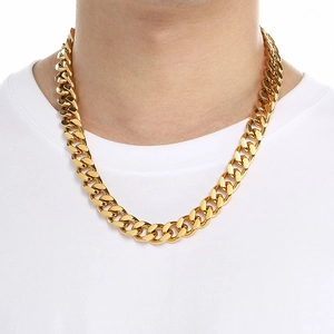 Classic gold stainless steel Cuban link chain necklace for men shown on neck model