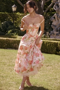 Floral print summer maxi dress detail with corset bodice and flowing romantic skirt
