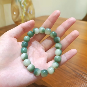 Natural weathered Bodhi seed bracelet with green gradient beads for elegant style