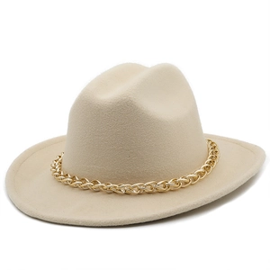 Close-up of beige felt fedora hat featuring a stylish chunky gold chain accessory
