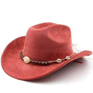 Detail of red faux suede cowboy hat featuring ethnic shell and wooden bead hatband