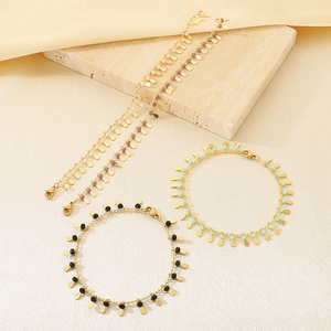 Elegant gold-plated bracelet set with colorful beads and water drop pendants on stones