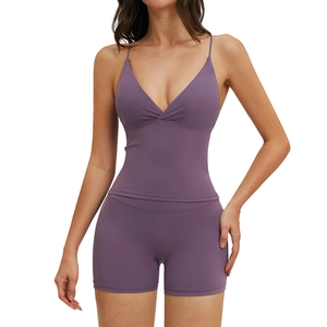 Women's deep purple yoga set with V-neck camisole top and high-waisted fitness shorts