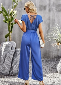 Detail of blue V-neck wide leg jumpsuit back view with elegant tie-back design