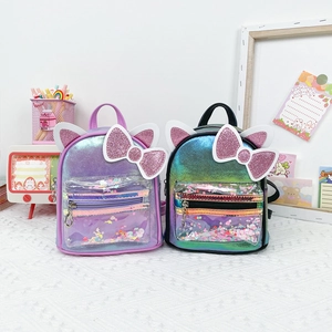 Cute cat-ear backpacks with sequin pockets and glitter bows in purple and iridescent green