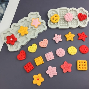 Silicone cookie mold set for DIY baking with star, heart, and square shapes in bright colors