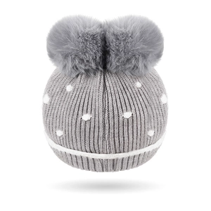 Gray knitted baby winter hat with double fluffy pom-poms and white polka dots pattern
