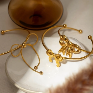Ensemble de bracelets nœuds élégants en acier inoxydable plaqué or 18 carats pour femme