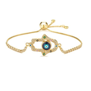 Adjustable golden Hamsa Hand bracelet with blue Evil Eye and micro-set cubic zirconia stones