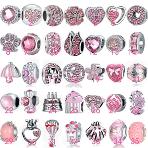 Collection of 35 pink DIY beads and charms in silver finish for custom bracelets