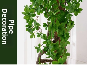 Close-up of artificial green foliage vines for indoor pipe and column decoration
