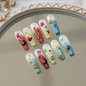 3D cartoon press-on nails in long coffin shape with stars and moon decorations