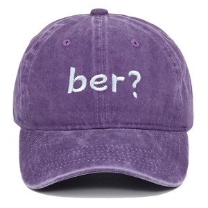 Detailed embroidery of 'ber?' text on a vintage washed purple cotton baseball cap
