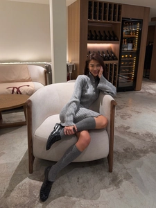 Elegant grey ribbed knit long sleeve dress with buttoned collar and matching socks