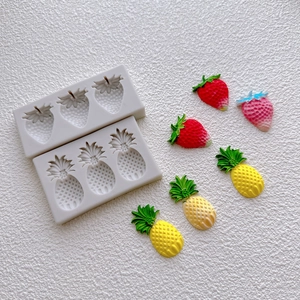 Silicone pineapple and strawberry molds with realistic fruit resin models for cake decor