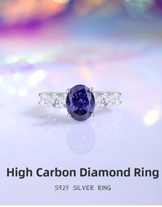 Macro shot of S925 silver ring featuring an oval blue center stone and pave zircon halo