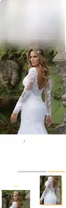 Detailed view of intricate floral lace patterns on a mermaid long sleeve wedding dress