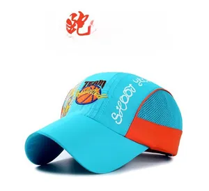 Detail view of children's blue and orange mesh baseball cap with basketball embroidery