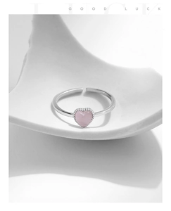 Detail of S925 sterling silver ring with pink heart cat eye stone and beaded edge