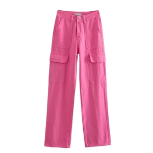 Detail of pink denim cargo pants with large side pockets and straight leg design