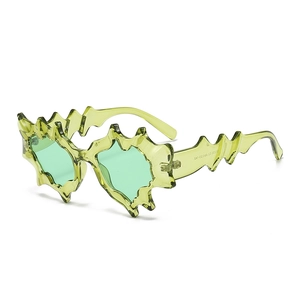 Fashionable oversized wave sunglasses in neon green with irregular frame for women and men