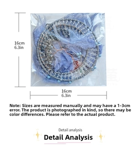 Detail view of purple feather dreamcatcher with crystal tree and 16cm size dimensions