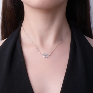 Detailed view of S925 silver leaf necklace featuring five marquise-cut Moissanite stones