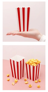Red and white striped popcorn paper boxes showing empty and filled options on pink background