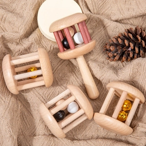 Handcrafted Montessori wooden baby rattle set with natural finishes for sensory play